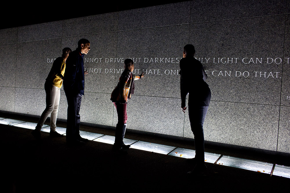 Bailey supports the Affordable Care Act more than he supports Obama, shown here with his family at the Martin Luther King, Jr. Memorial 